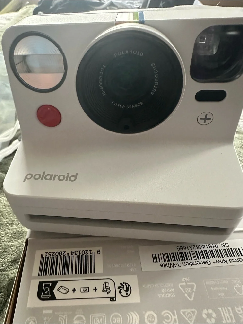 NEW IN BOX. Polaroid White Instant Camera with Rainbow Accent. NEVER USED.